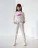 Дитячий спортивний костюм для дівчинки молочний оптом keep going СКД kg-молочний фото 1