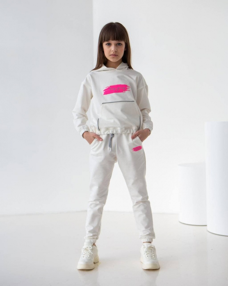 Дитячий спортивний костюм для дівчинки молочний оптом keep going СКД kg-молочний фото